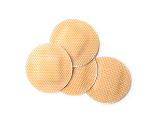 Photo of Medical sticking plasters isolated on white. First aid item