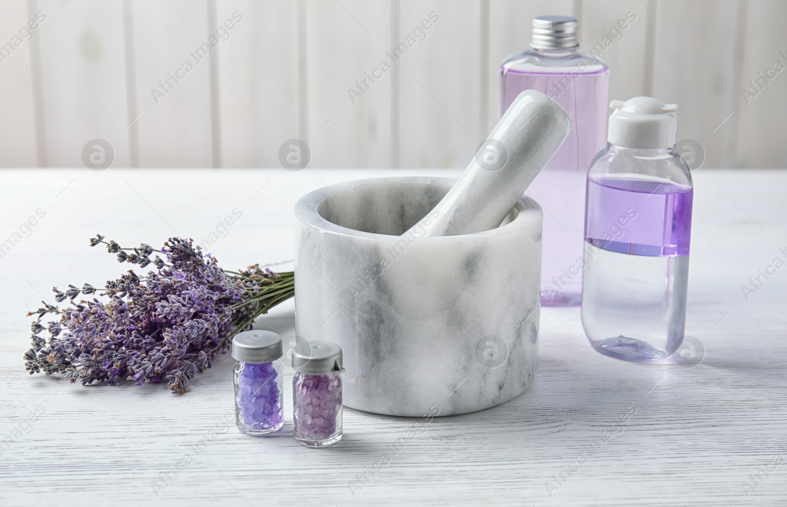 Photo of Composition with lavender flowers and natural cosmetic products on table