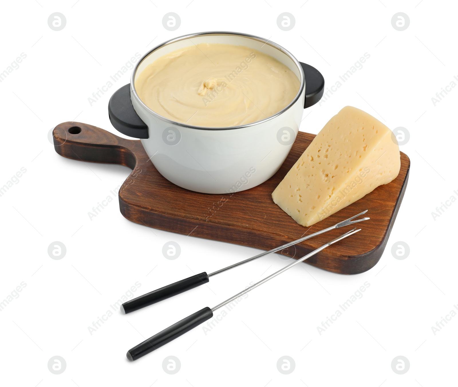 Photo of Fondue with tasty melted cheese, forks and piece isolated on white