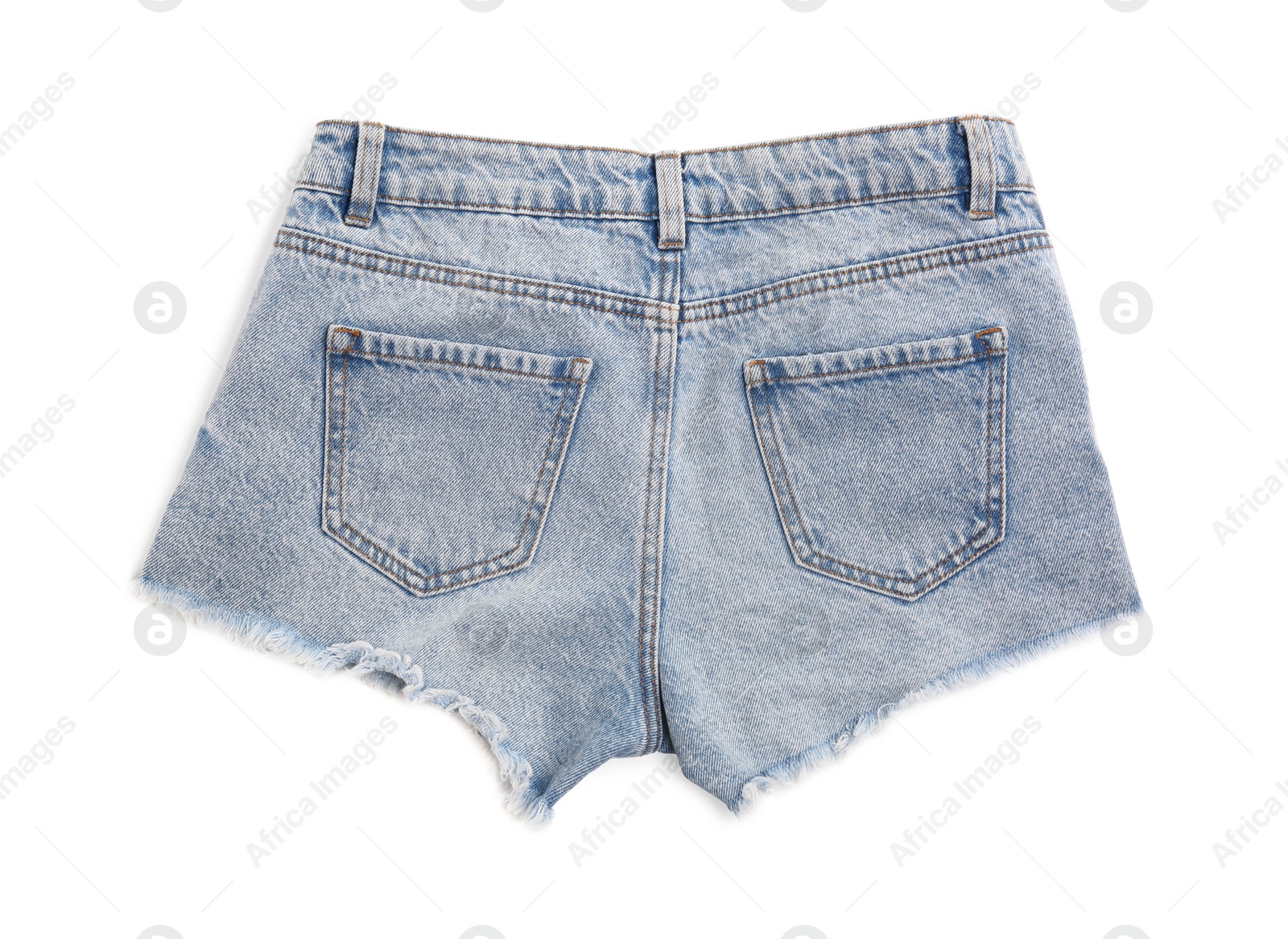 Photo of Light blue jean shorts isolated on white, top view. Stylish clothes