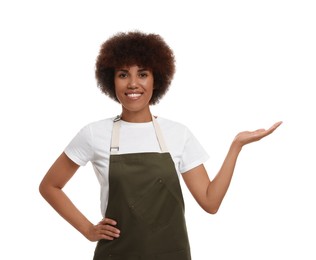 Portrait of happy young woman in apron on white background