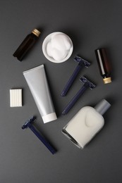 Photo of Flat lay composition with shaving accessories for men on grey background