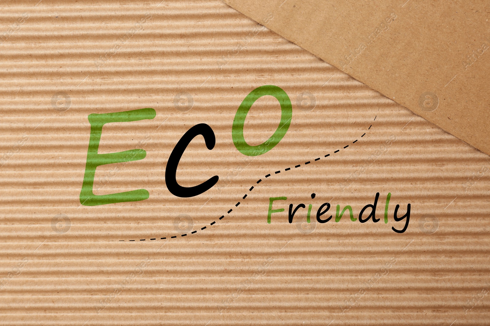 Image of Phrase Eco Friendly written on cardboard, top view