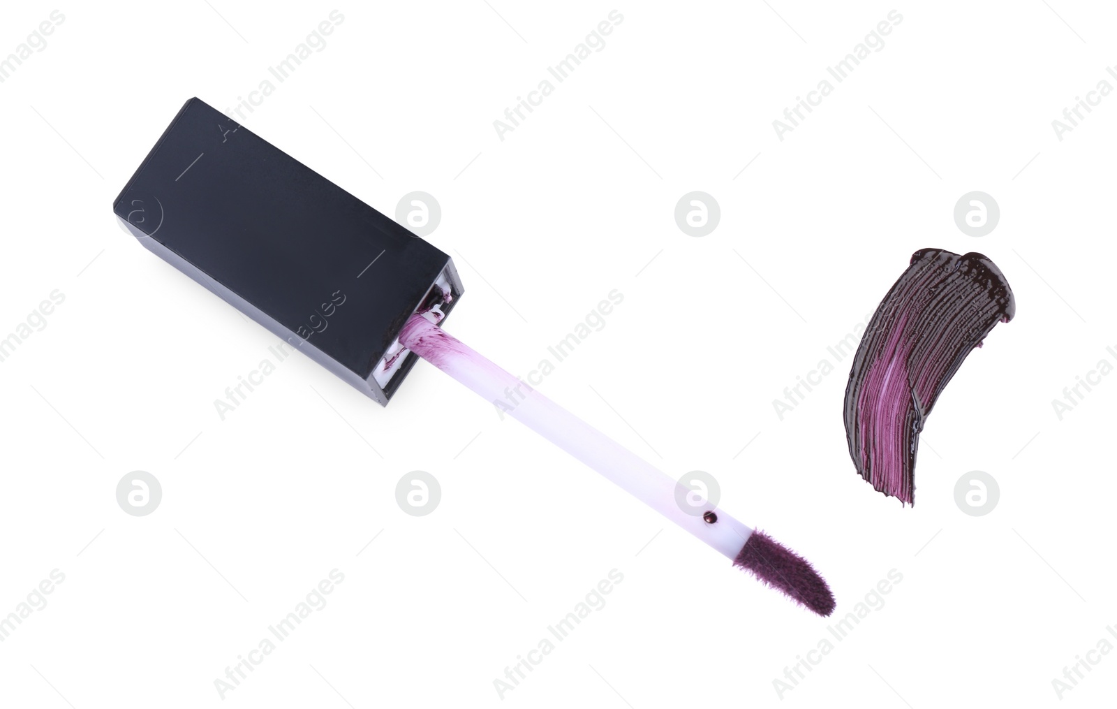 Photo of Stroke of purple lip gloss and applicator isolated on white, top view