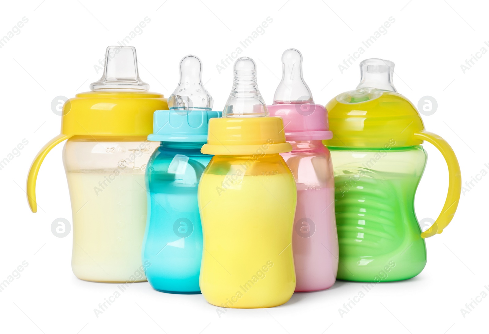 Photo of Feeding bottles with milk on white background