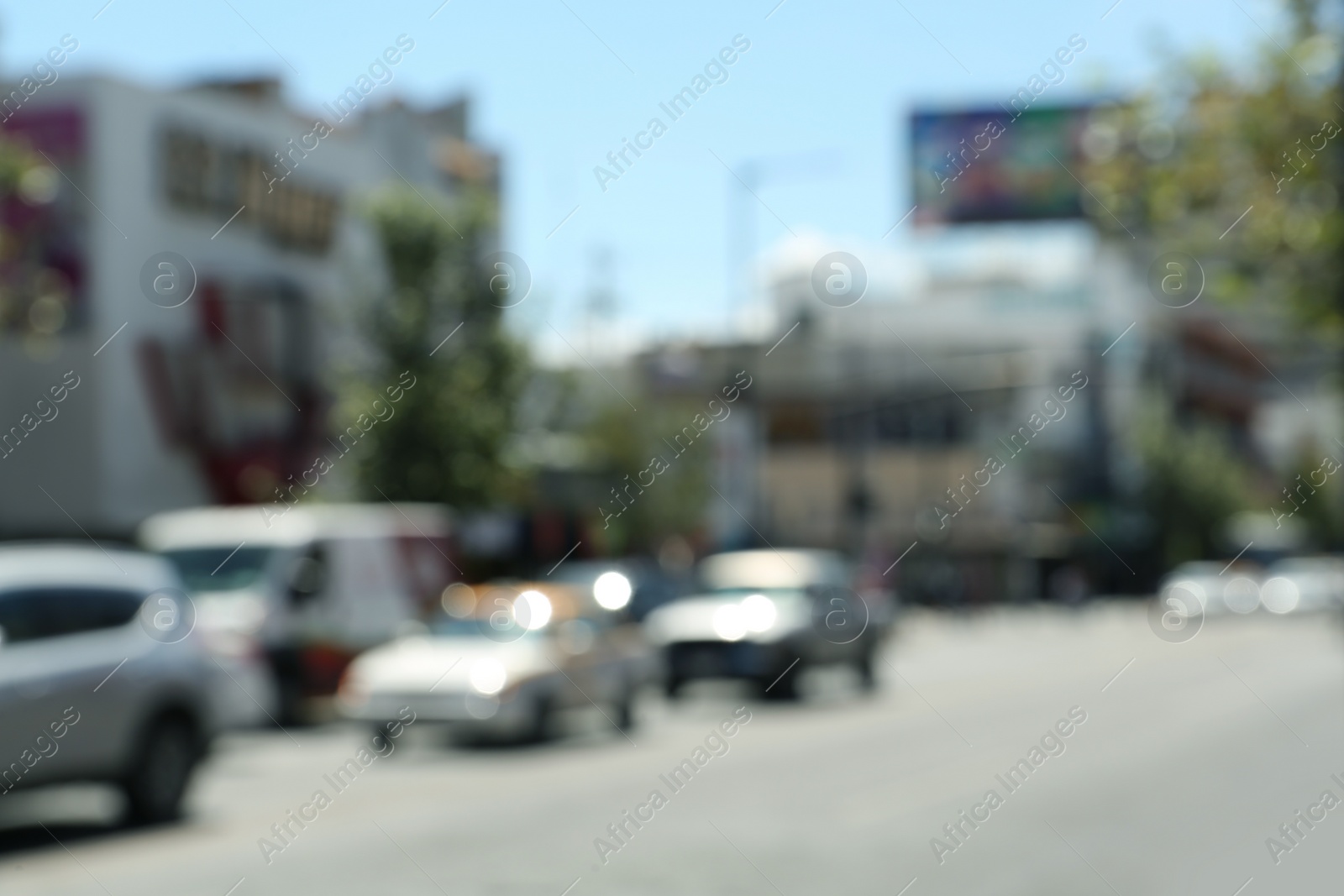 Photo of Blurred view of transport on city street. Bokeh effect