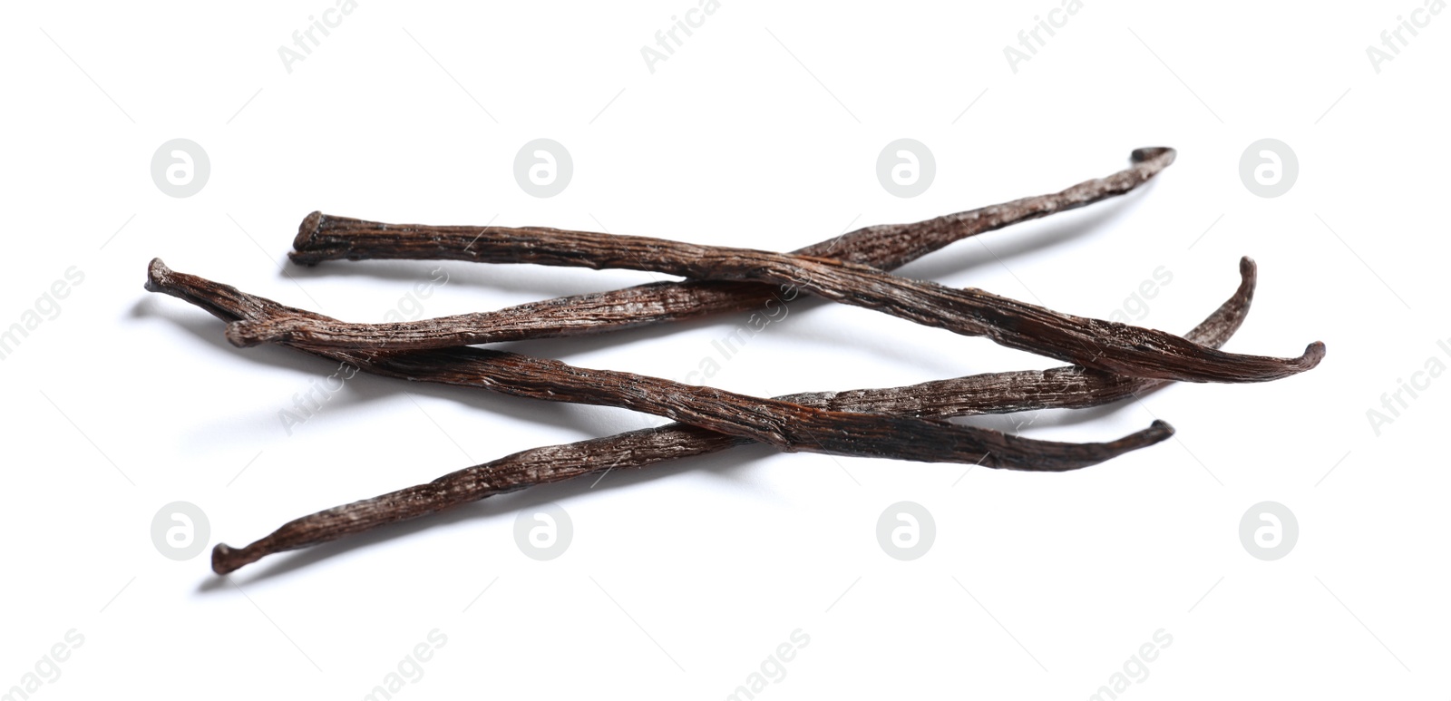 Photo of Aromatic vanilla sticks on white background