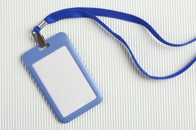 Photo of Blank badge on white background, top view. Mockup for design