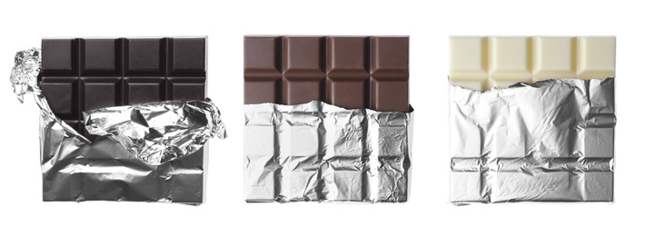 Image of Set with different chocolate bars on white background, top view. Banner design