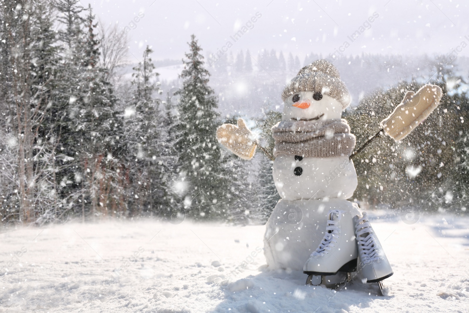 Image of Funny snowman outdoors on sunny day, space for text