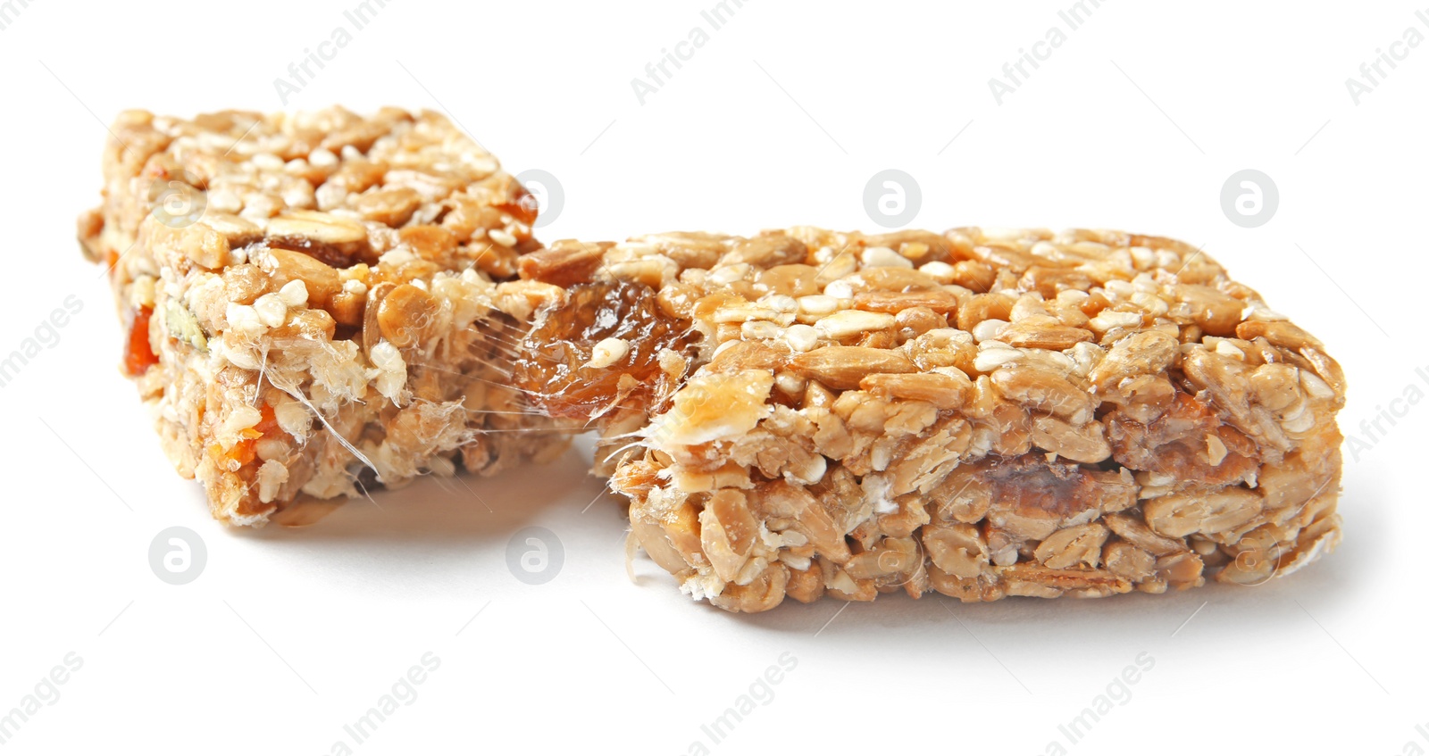 Photo of Grain cereal bar on white background. Healthy snack