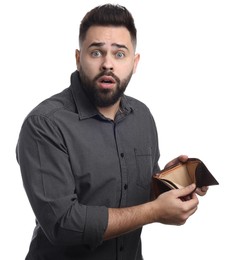 Photo of Confused man showing empty wallet on white background