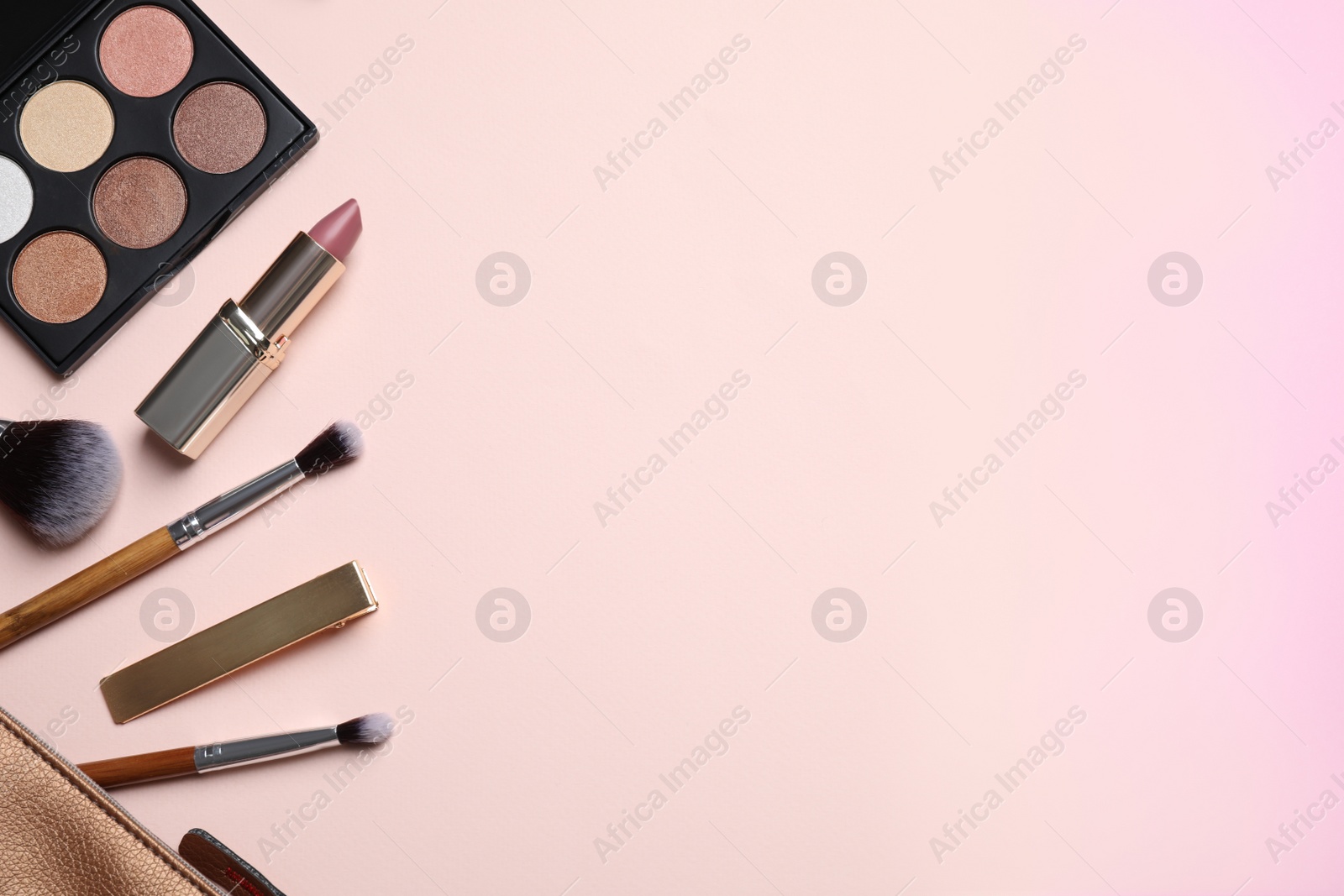 Photo of Makeup brushes and cosmetic products on beige background, flat lay. Space for text