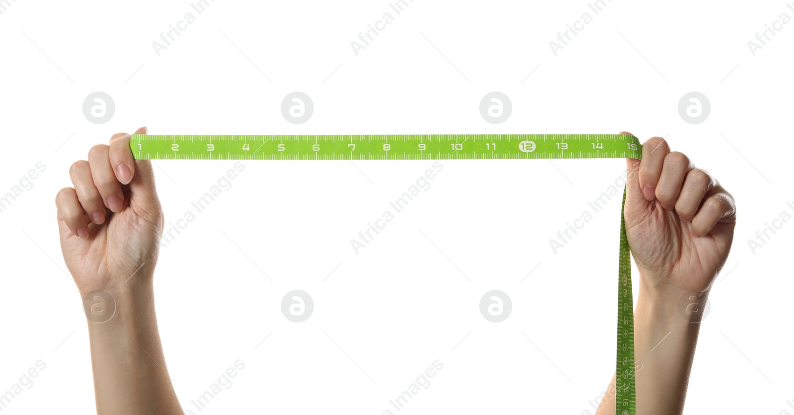 Photo of Woman holding green measuring tape on white background, closeup