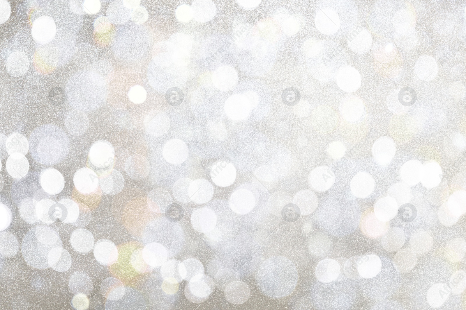 Image of Shiny silver glitter as background. Bokeh effect