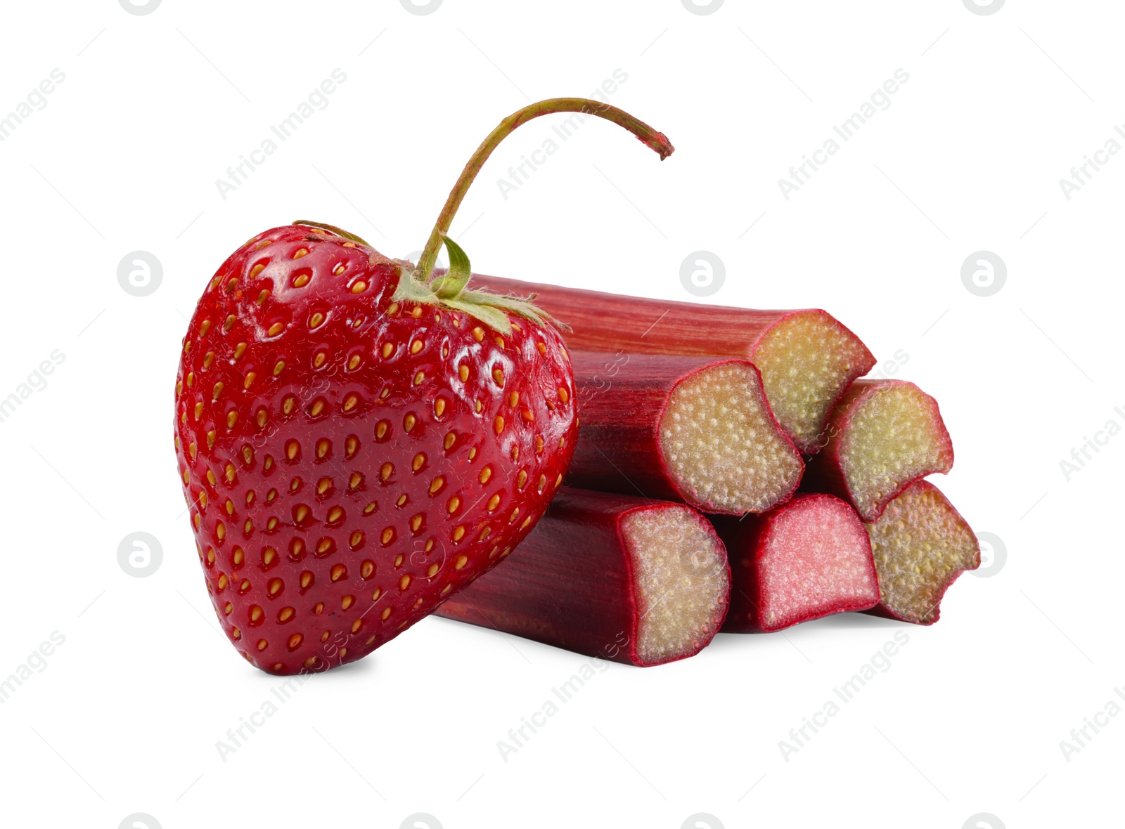 Photo of Stalks of fresh rhubarb and strawberry isolated on white