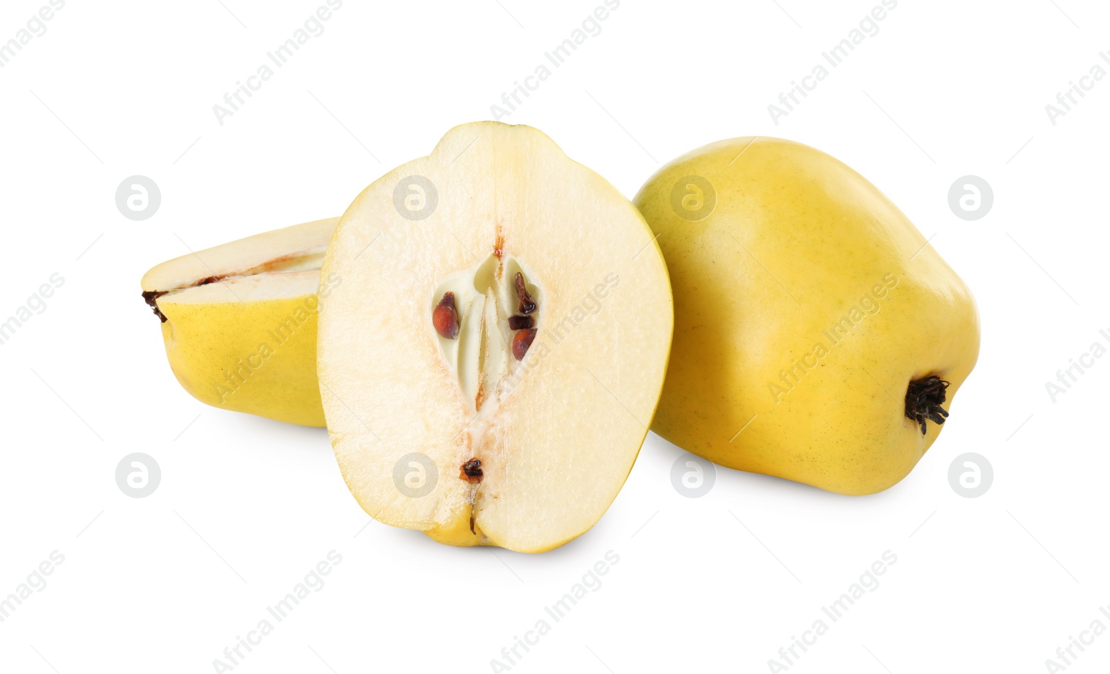 Photo of Ripe whole and cut quinces isolated on white