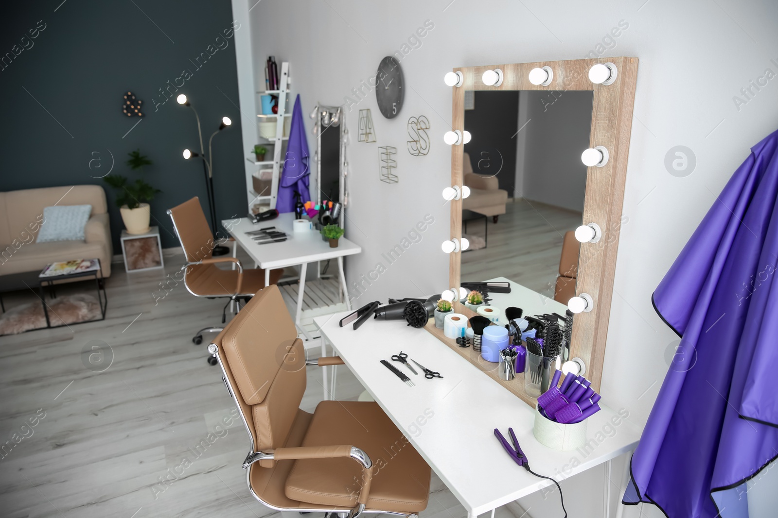 Photo of Stylish hairdressing salon interior