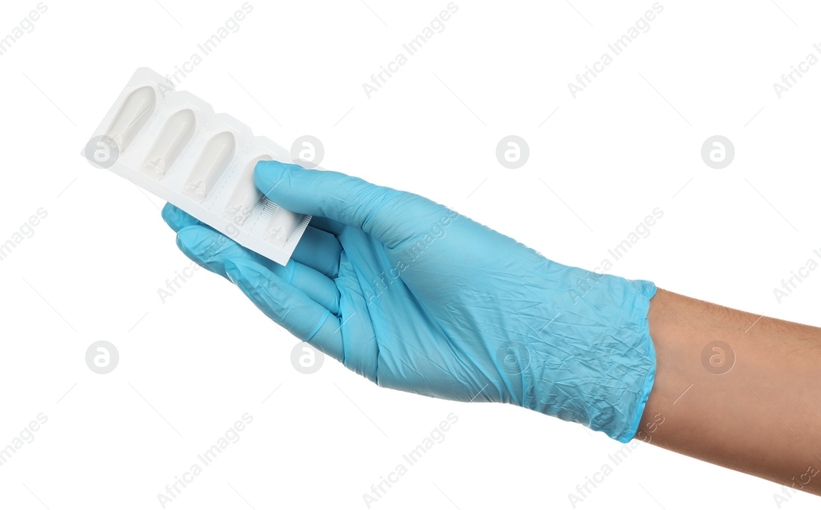 Photo of Doctor holding suppositories on white background. Hemorrhoid problems