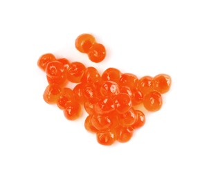 Photo of Pile of delicious red caviar isolated on white, top view