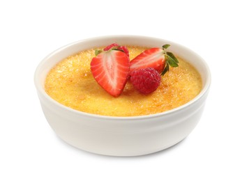 Photo of Delicious creme brulee with fresh berries isolated on white