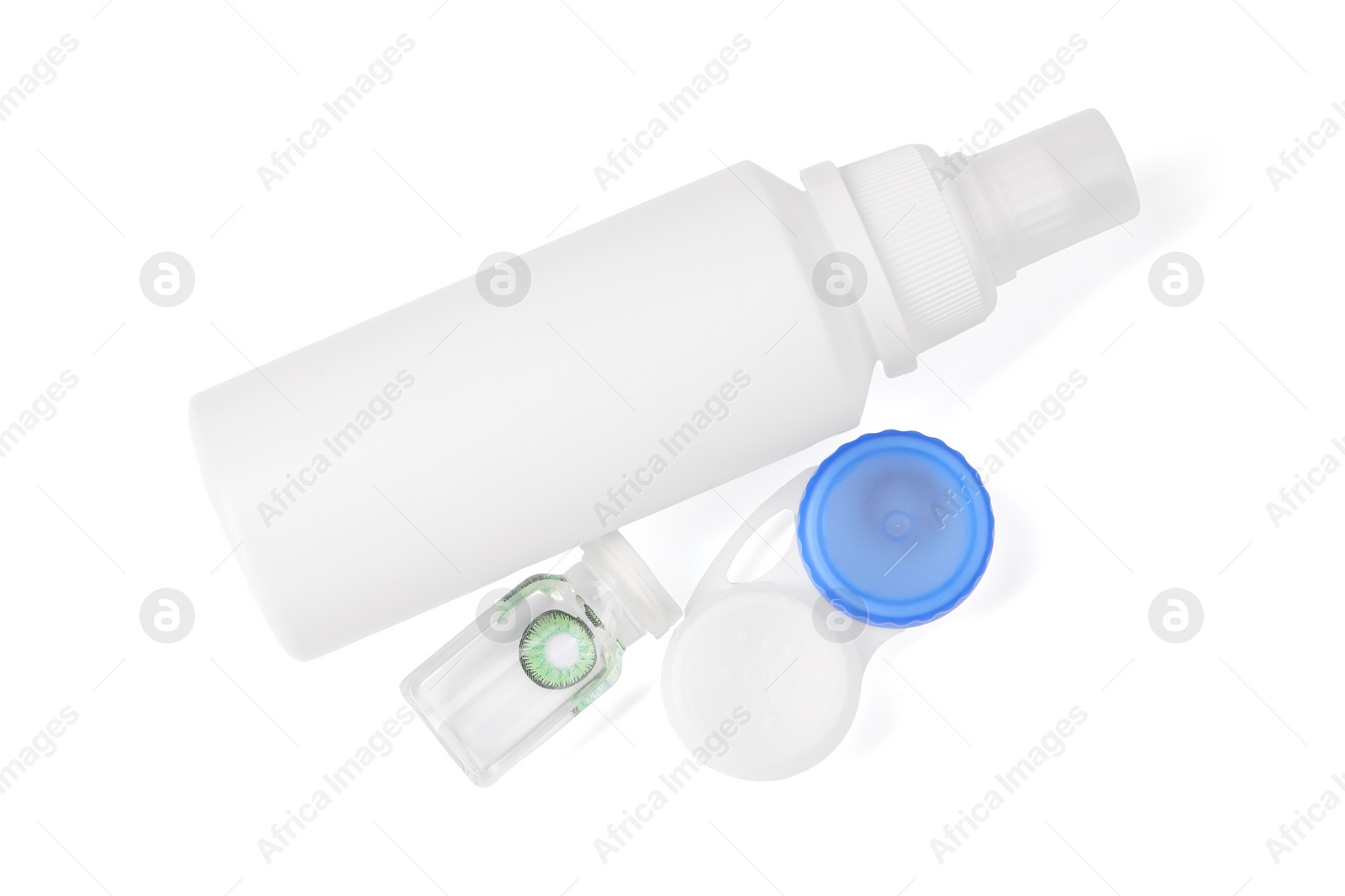 Photo of Color contact lenses and bottles of cosmetic product isolated on white, top view