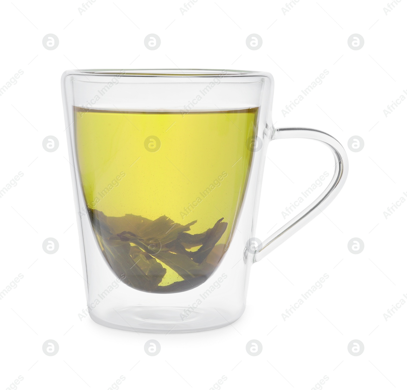 Photo of Fresh green tea in glass mug and leaves isolated on white