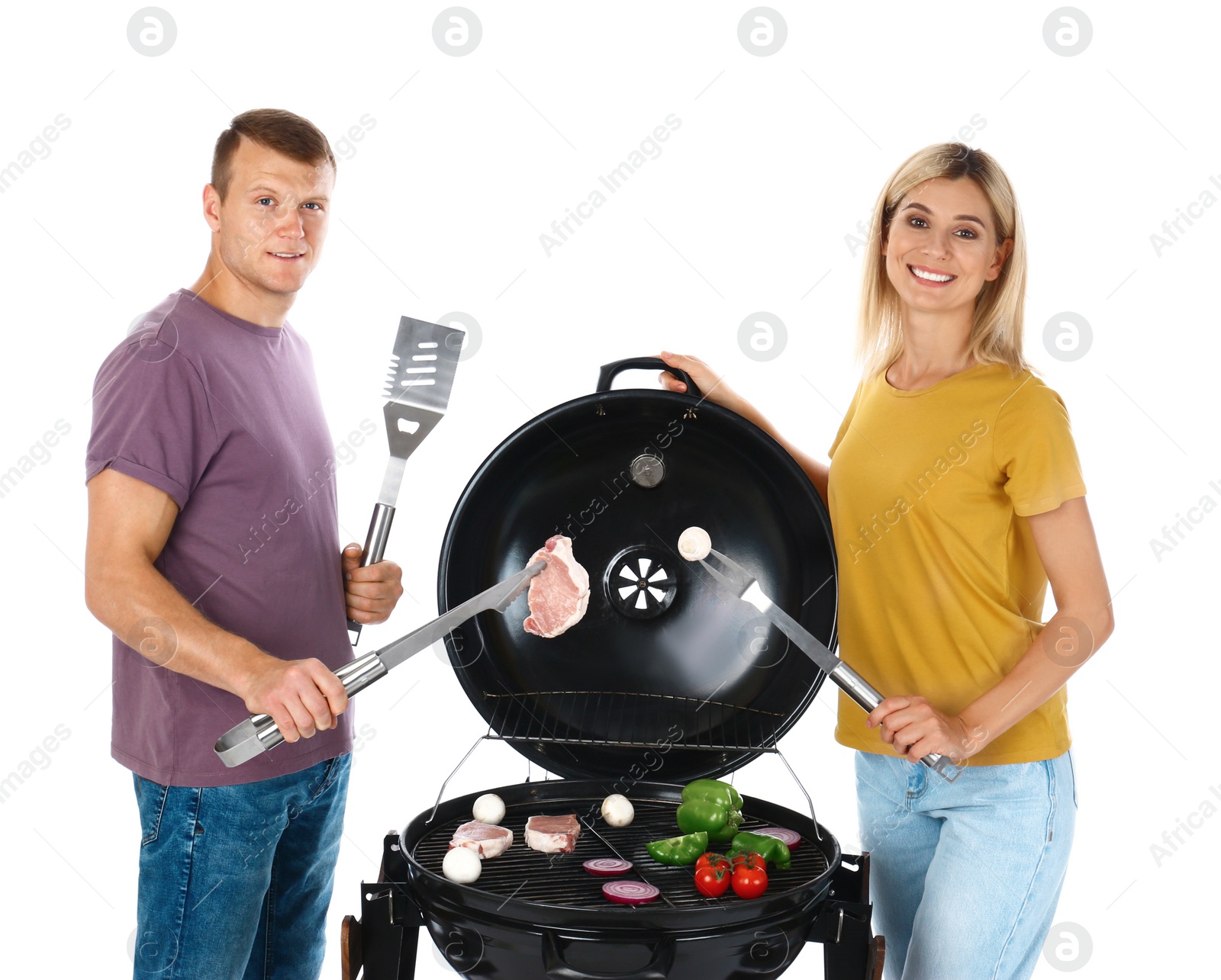 Photo of Happy couple cooking on barbecue grill, white background