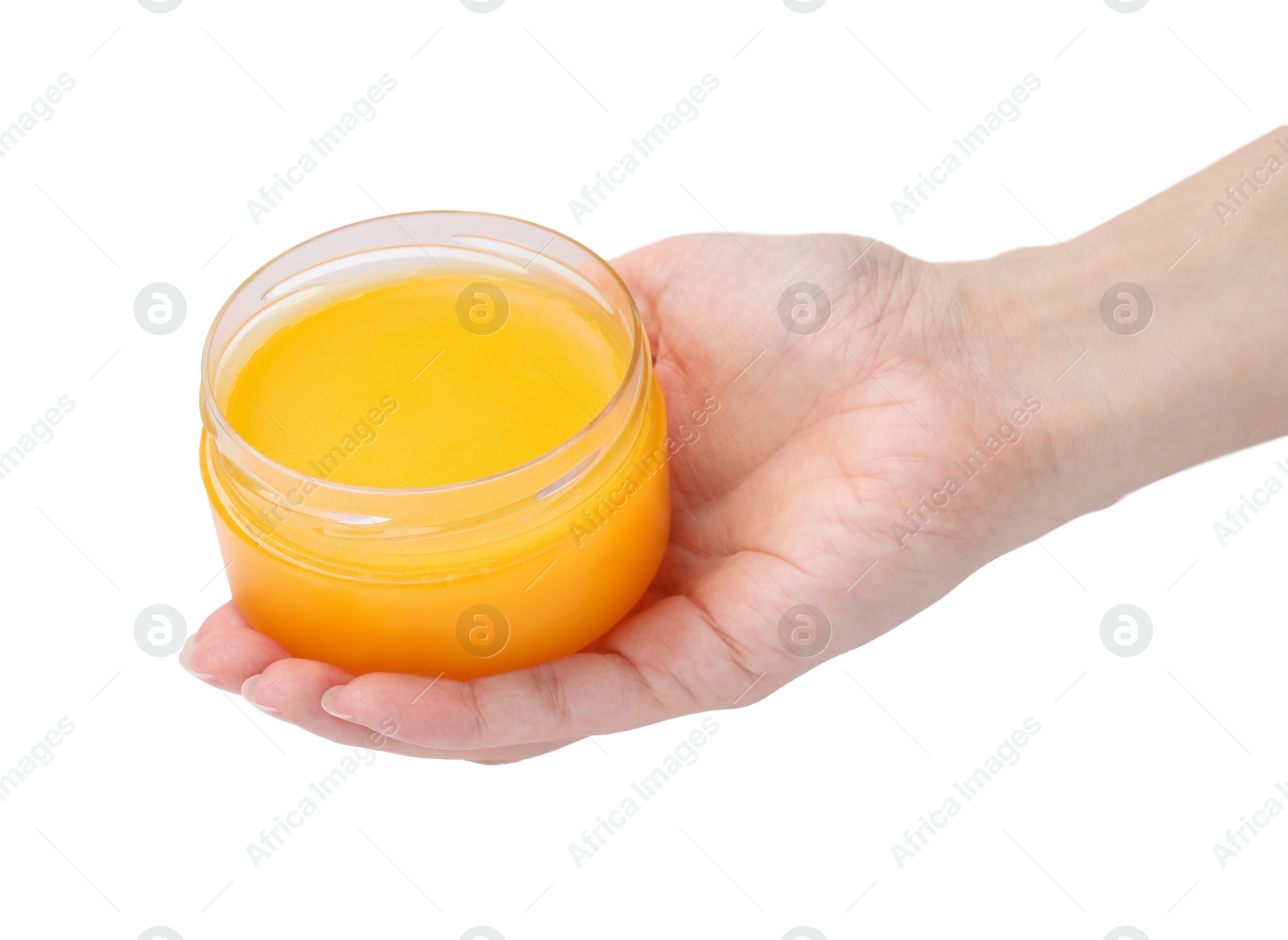 Photo of Woman holding jar of petrolatum on white background, closeup