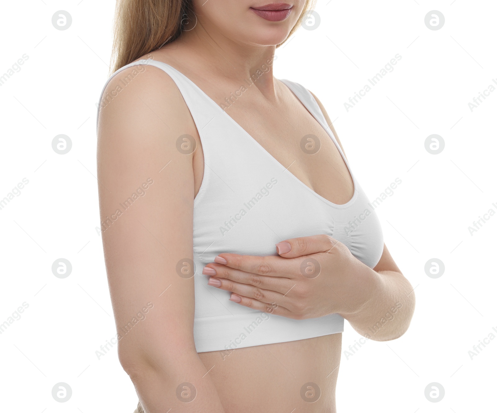 Photo of Mammology. Young woman doing breast self-examination on white background, closeup