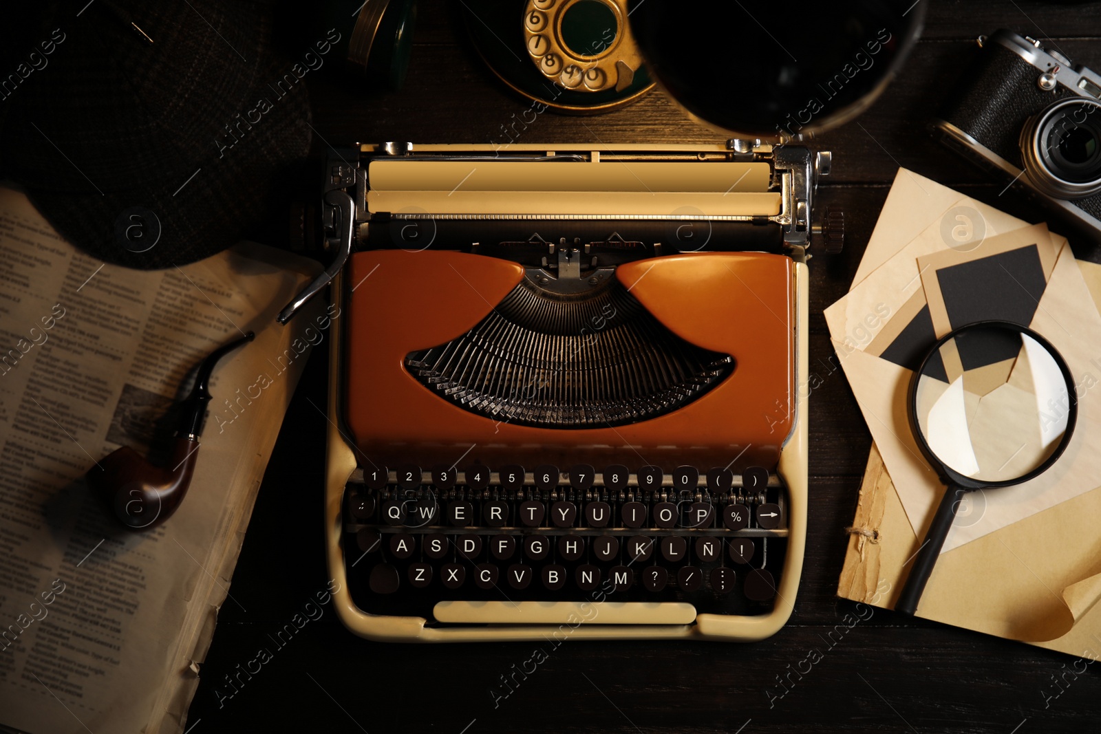 Photo of Flat lay composition with vintage detective items on dark wooden background