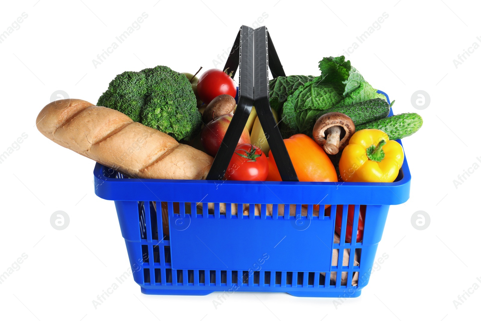 Photo of Shopping basket with grocery products on white background