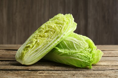 Fresh ripe Chinese cabbages on wooden table