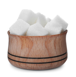 Photo of Refined sugar cubes in wooden bowl isolated on white