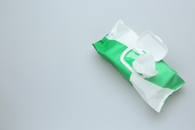 Image of Wet wipes flow pack on light background, top view. Space for text