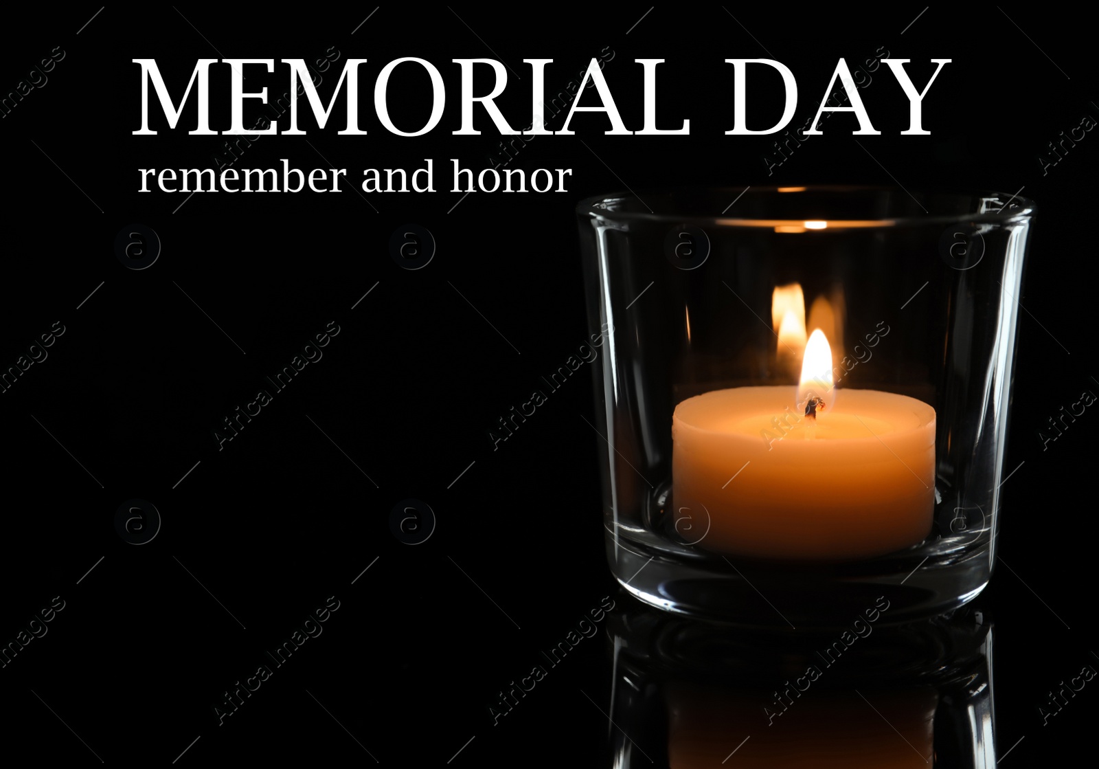 Image of Memorial day. Wax candle burning on black background