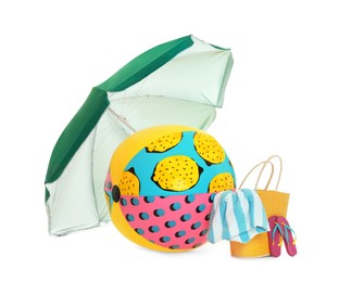 Photo of Open green beach umbrella, inflatable ball and accessories on white background