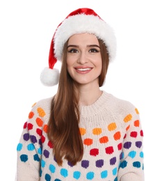 Photo of Happy young woman in Santa hat and sweater on white background. Christmas celebration