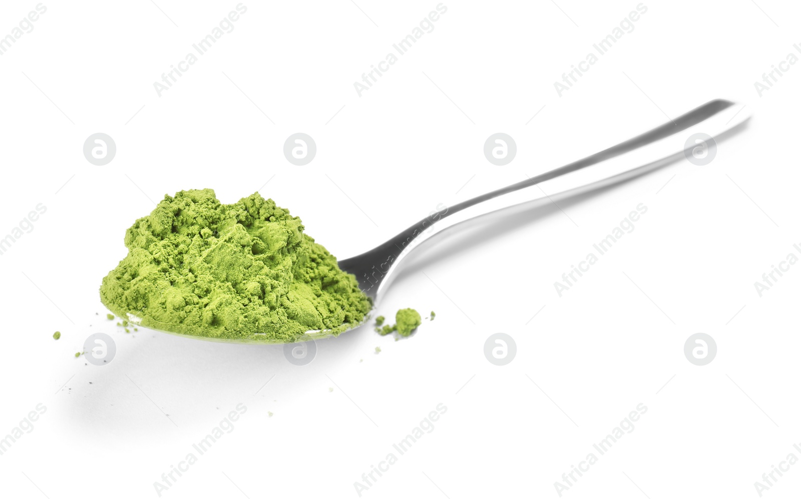 Photo of Spoon with powdered matcha tea on white background