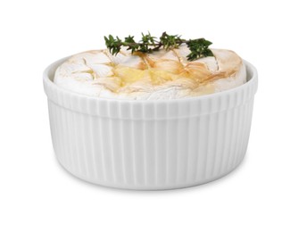 Photo of Tasty baked camembert and thyme in bowl isolated on white