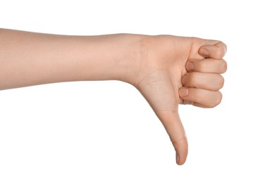 Photo of Woman showing thumb down gesture on white background, closeup of hand