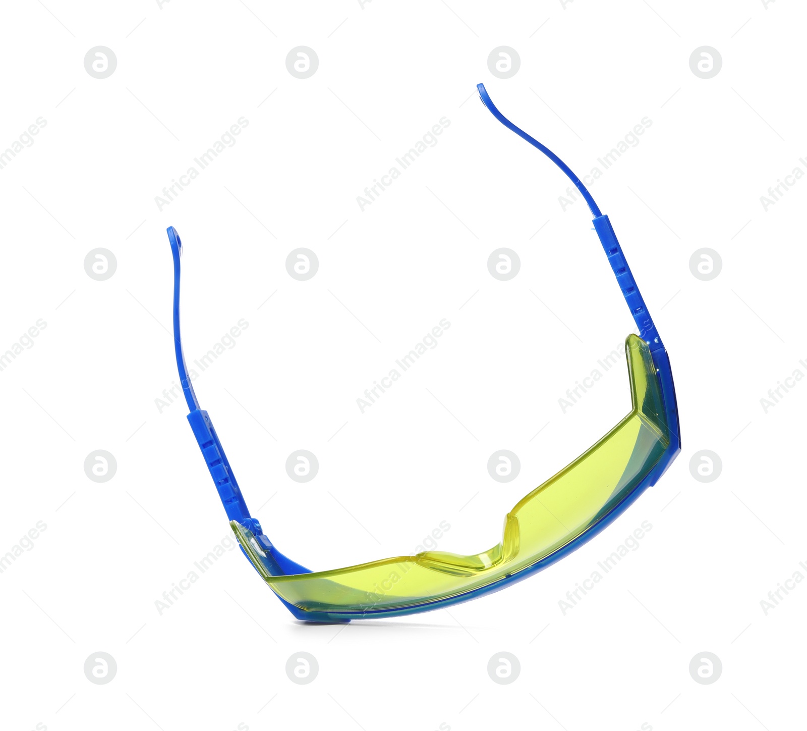 Photo of Protective goggles on white background. Construction tool