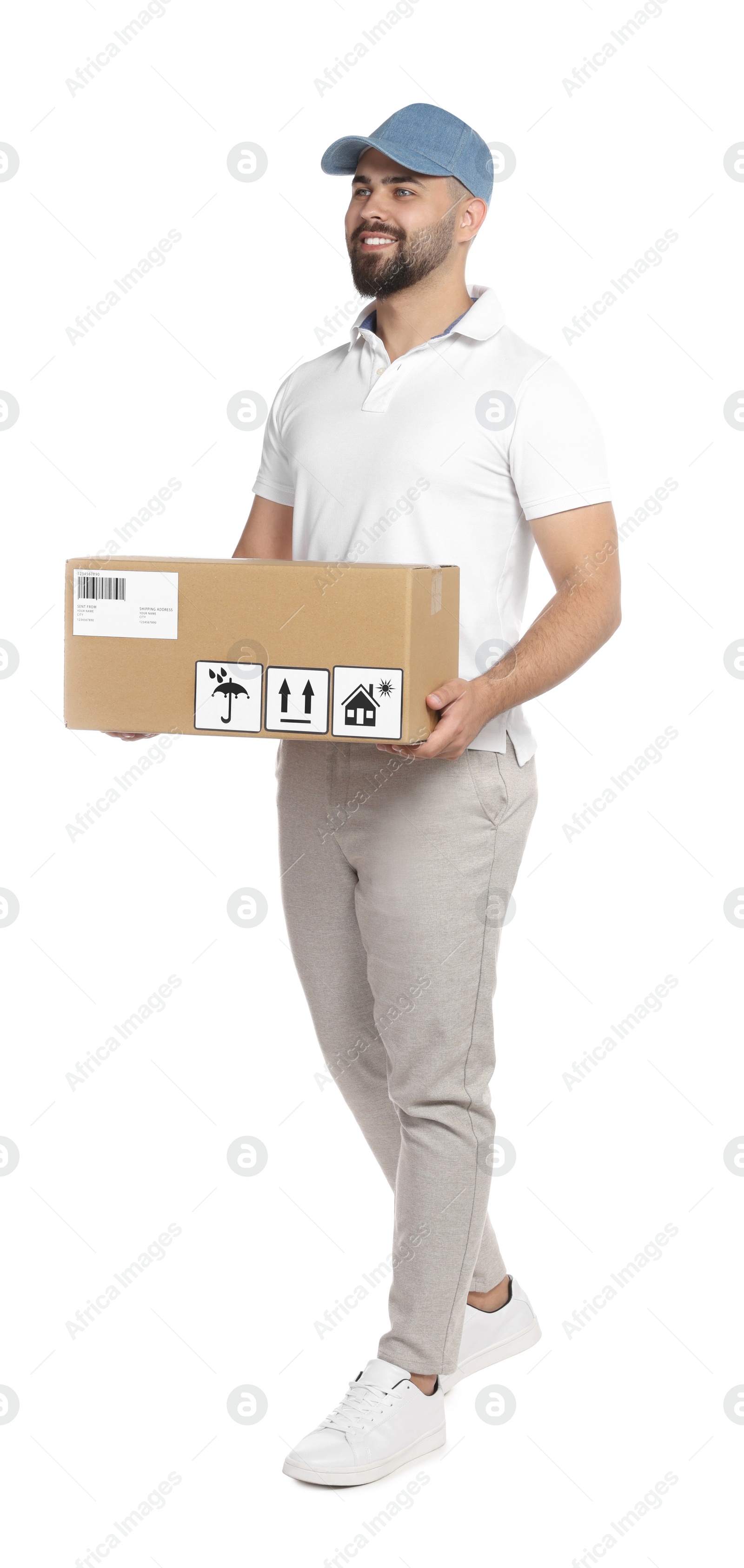 Photo of Courier holding cardboard box on white background