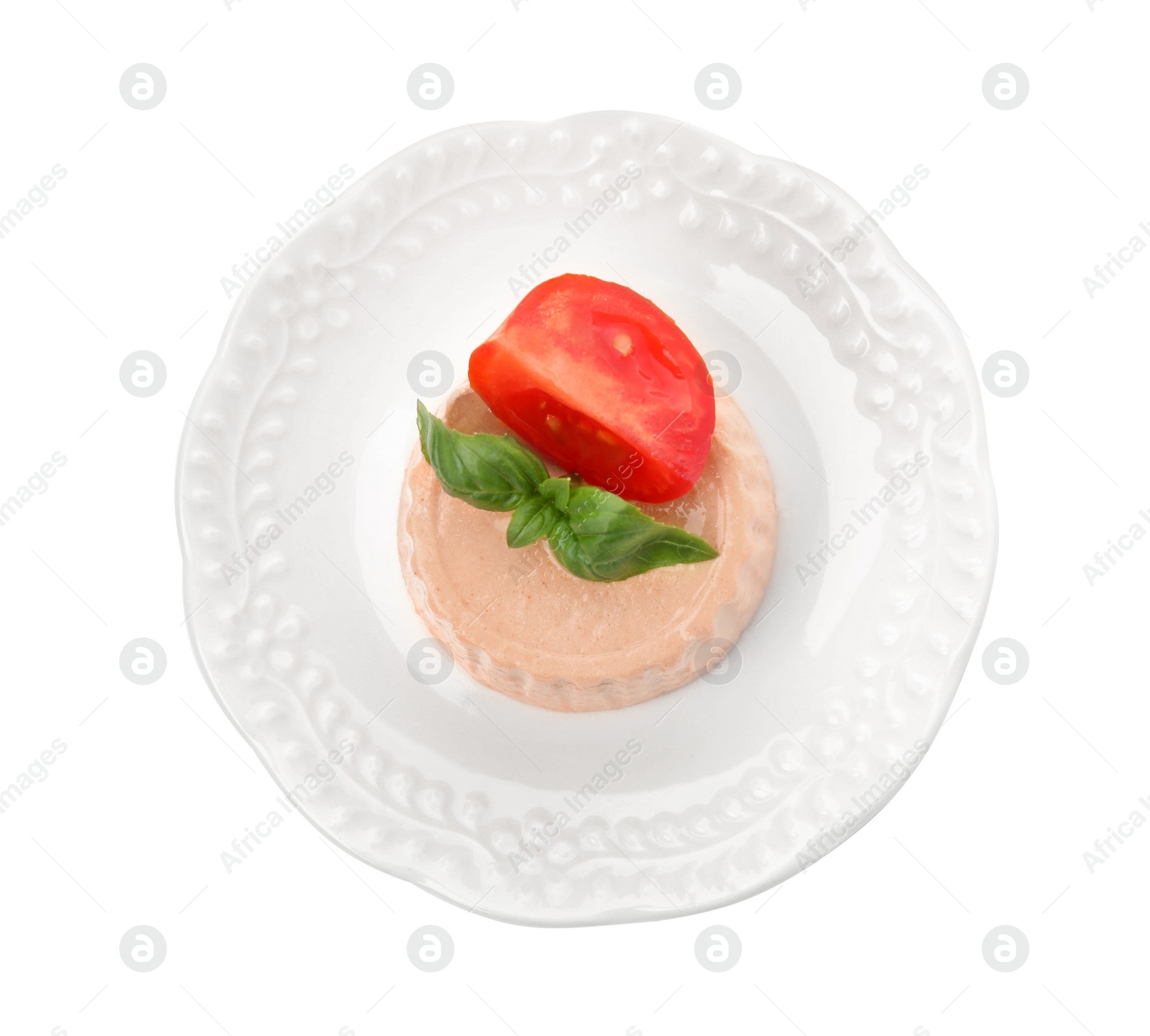 Photo of Plate with delicious meat pate, tomato and basil isolated on white, top view