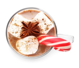 Photo of Glass cup of tasty cocoa with marshmallows, Christmas candy cane and anise isolated on white, top view