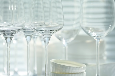 Set of empty wine glasses on blurred background, closeup