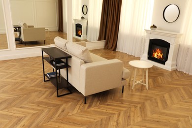 Photo of Modern living room with parquet flooring and fireplace