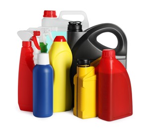 Photo of Many bottles and canisters with liquids on white background
