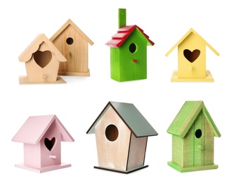 Image of Set with different beautiful bird houses on white background