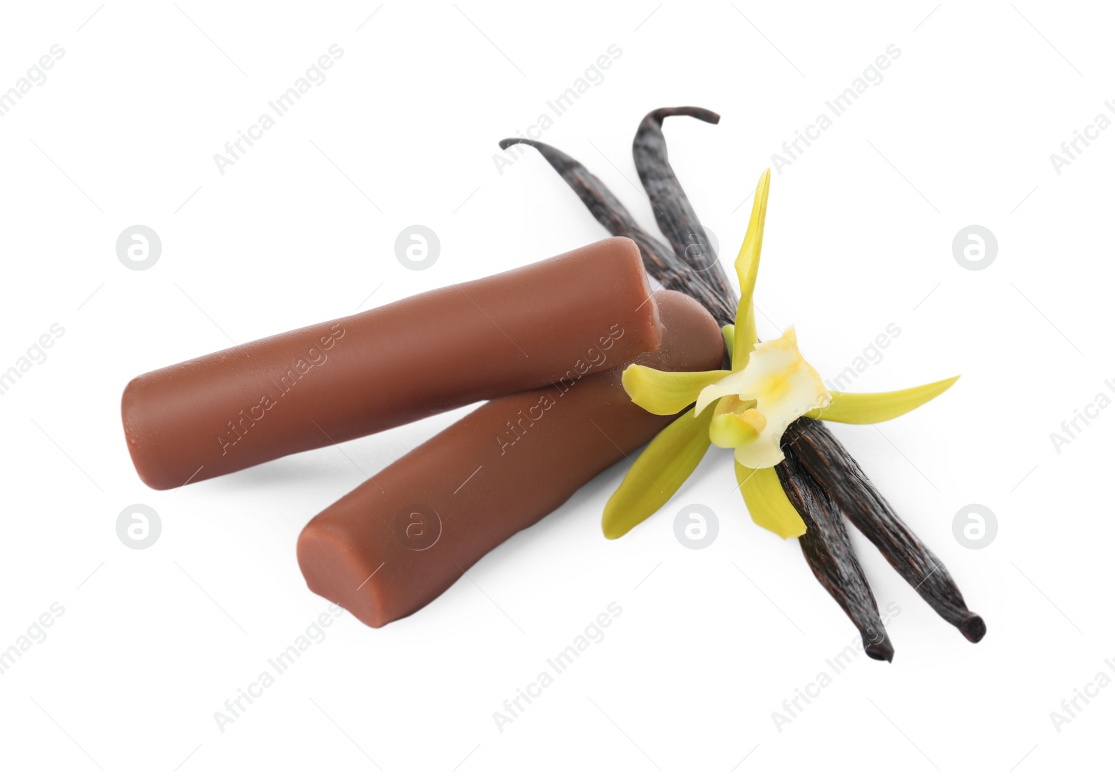 Photo of Glazed curd cheese bars, vanilla pods and flower isolated on white